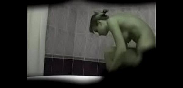  Young woman spy shower